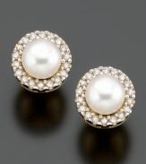 A simply glamorous addition to any look. 14k gold earrings featuring cultured freshwater pearl (4 mm) and diamond accents.