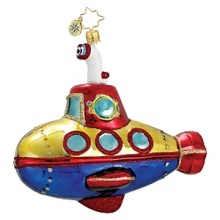 A whimsical, boldly colored submarine glass holiday ornament. A whimsical, boldly colored submarine glass holiday ornament.