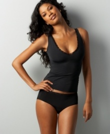 Feel lovely all day long in this pretty camisole with comfortable straps and lacy details by Jockey. With a low-cut V neck at one side and a higher-cut V neck at the other, you can wear it how you want it for total versatility! Style #6533 Feel lovely all day long in this pretty camisole with comfortable straps and lacy details by Jockey. With a low-cut V neck at one side and a higher-cut V neck at the other, you can wear it how you want it for total versatility! Style #6533