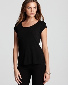 A classic tee, given a luxurious update in luxurious pure silk. Team this Eileen Fisher creation with dark denim and pointed pumps for day. A classic tee, given a luxurious update in luxurious pure silk. Team this Eileen Fisher creation with dark denim and pointed pumps for day.