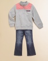 The iconic A stitching on the back pockets, a slim fit and bootcut leg silhouette make for effortlessly cool style. Adjustable waist with belt loops Zip and button closure Slim fit with slight stretch Faded details Metal rivet details Patch logos on back waist and pocket Decorative topstitching 5-pocket style 98% cotton/2% elastane Machine wash Imported of Italian fabric