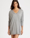 Softest modal jersey draped from shoulder to hem in a cozy tunic-length pullover.V-neckDropped shouldersDolman sleevesGathered back88% modal/12% viscoseHand washImported