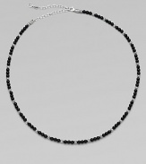 A single strand of black onyx beads and sterling silver stations makes a modern statement.Sterling silverOnyxAbout 19½ long with 4½ extenderLobster claspImported