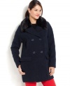 Snuggle into the chicest silhouette of the season in Tommy Hilfiger's boucle cocoon coat, complete with faux-fur trim.