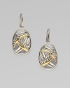 From the Papyrus Collection. Smooth and cable curves of sterling silver and 18k yellow gold richly intertwine within egg shapes.Sterling silver and 18k yellow gold Length, about ¾ Ear wire Imported