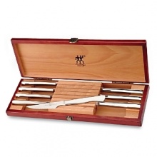 Eight stainless steel steak knives in a beautiful wood gift box by J.A. Henckels, a name synonymous for unsurpassed quality and craftsmanship. Eight stainless steel steak knives in a beautiful wood gift box by J.A. Henckels, a name synonymous for unsurpassed quality and craftsmanship.