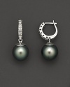 Cultured Tahitian pearls and diamond hoop earrings.