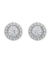 Add spark to your style with subtle fashion. Swarovski's chic, circular studs feature a round-cut crystal center stone surrounded by sparkling crystal edges. Crafted in silver tone mixed metal. Approximate diameter: 1/3 inch.
