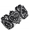 Heartfelt appreciation. This bangle bracelet from Betsey Johnson is crafted from black-plated mixed metal with glass crystal accents adding a lustrous touch. Approximate diameter: 2-3/8 inches.