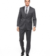 Versatile, stylish and endlessly comfortable, this solid Calvin Klein suit is the foremost choice for any modern man's tailored wardrobe.