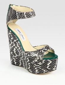 Sleek snakeskin with contrasting patent leather trim and an exposed back zipper. Self-covered wedge, 5½ (140mm)Covered platform, 2 (50mm)Compares to a 3½ heel (90mm)Snakeskin and patent leather upperBack zipperLeather lining and solePadded insoleMade in ItalyOUR FIT MODEL RECOMMENDS ordering one half size up as this style runs small. Sleek snakeskin with contrasting patent leather trim and an exposed back zipper. Self-covered wedge, 5½ (140mm)Covered platform, 2 (50mm)Compares to a 3½ heel (90mm)Snakeskin and patent leather upperBack zipperLeather lining and solePadded insoleMade in ItalyOUR FIT MODEL RECOMMENDS ordering one half size up as this style runs small.