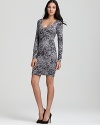 Tap into your wild side in this supremely flattering Velvet by Graham & Spencer lizard-print dress.