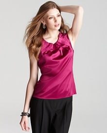 A knife pleated neckline adds texture to the Elie Tahari Winona top, the perfectly effortless blouse that you'll reach for time and time again. A knife pleated neckline adds texture to the Elie Tahari Winona top, the perfectly effortless blouse that you'll reach for time and time again.