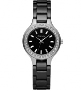 Glamor time: Crystals and black ceramic dress up this watch by DKNY. Round polished stainless steel case and black ceramic bracelet. Crystals at bezel. Black dial features logo and silvertone stick indices and hands. Quartz movement. Water resistant to 50 meters. Two-year limited warranty.