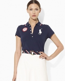 An iconic polo shirt is crafted in a slim stretch silhouette from breathable cotton mesh and accented with bold country embroidery to celebrate Team USA's participation in the 2012 Olympics. An iconic polo shirt is crafted in a slim stretch silhouette from breathable cotton mesh and accented with bold country embroidery to celebrate Team USA's participation in the 2012 Olympics.