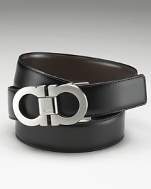 Salvatore Ferragamo classic Double Gancini reversible belt. Quintessentially classic and luxurious reversible leather belt with topstitching detailing and double-brushed buckle. Ferragamo is engraved on the buckle.