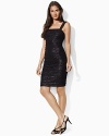Crafted from softly shirred tulle and glimmering sequined mesh, this sheath dress channels vintage romance with ruched details and feminine cap sleeves.