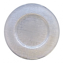 This glass charger adds incredible dimension to any table setting. Dishwasher and microwavable safe. This glass charger adds incredible dimension to any table setting. Dishwasher and microwavable safe.
