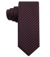 Sometimes skinny is just the solution. This striped skinny tie from Alfani will flawlessly fit into almost any style you sport.