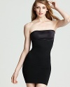 Get that sleek look you've always wanted with the Spanx® strapless slip. Body hugging dresses have never looked better.