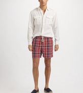 A quick-dry swim classic ideal for everyday swims and holiday jaunts alike, crafted with a standard fit and preppy plaid checks. Drawstring elastic waist Logo embroidery Side slash, patch pockets Mesh lining Inseam, about 4¾ 52% cotton/48% nylon; machine wash Imported 