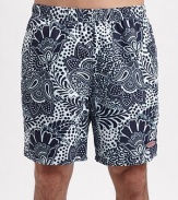 An eye-catching contrast paisley pattern lends modern style to an easy-fitting swim favorite. Elastic waist with internal drawstring Side slash, back patch pockets Mesh lining Inseam, about 7 Polyester Machine wash Imported 