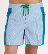 A quick-dry look with printed mini-stripes revive a classic beach style. Drawstring waistBack flap pocketsMesh liningInseam, about 6PolyesterMachine washImported 