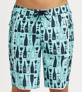 Modern, quick-dry trunks for the beach, board and beyond with with a printed beach-drink design and comfortable knee length. Drawstring waistBack flap pocketsPockets: mesh liningInseam, about 9½PolyesterMachine washImported 