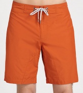 Engineered board shorts, perfect for traipsing the streets or surfing the waves, set in quick drying cotton-nylon.Drawstring waistZip flyBack welt pocketsInseam, about 855% cotton/45% nylonMachine washImported