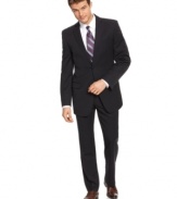 Dark and dynamic. This sleek DKNY suit is a go-to look for your tailored wardrobe.