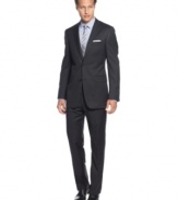 Designing with admirable understatement, DKNY tailors a slim-fit suit  with a longer, leaner line.