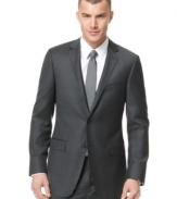 The perfect jacket. This DKNY slim-fit charcoal style gives your torso the shape it needs for a clean, streamlined look.