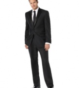 Elegantly simple, this sophisticated two-button tuxedo is a classic choice for black-tie affairs. Traditionally tailored, the jacket features satin-covered buttons, a notched satin lapel, chest welt pocket and front flap pockets with satin besoms. No back vent. Double reverse-pleated pant has on-seam pockets, suspender buttons instead of belt loops and satin braids on the side seam. Back besom pockets.