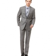 In a cool gray palette, this sleek trim-fit suit from DKNY lightens your look while maintaining strength and sophistication.