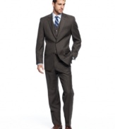 See what the power of three can do for you. This classic suit from Michael Kors can be worn with or without a vest for ultimate versatility.