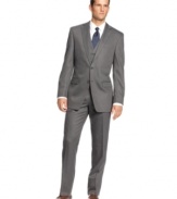 A classic goes cool. This three-piece suit from Calvin Klein is cut in a slim style for the most modern take.