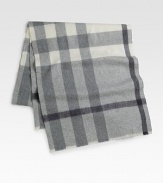 An elegant winter essential in a tonal plaid pattern with unfinished edges.Raw edges78 X 14WoolDry cleanMade in Great Britain
