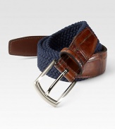 EXCLUSIVELY OURS. Superior stretch and casual comfort in a woven elastic style with alligator-embossed leather trim. Satin nickel buckle About 1¼ wide Made in USA
