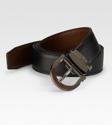 A modern classic crafted in reversible calfskin leather with an adjustable gancino buckle. Reverses from black to brown Leather Ruthenium buckle About 1½ wide Made in Italy 