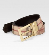 Iconic check design in a reversible belt, perfect for everyday, with an engraved logo buckle.PVC/Leather1 wideMade in Italy