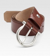 This distinguished style is rendered in luxe saddle leather with an adjustable design and shiny palladio gancini buckle.CalfskinPalladio buckleAbout 1½ wideMade in Italy