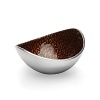 Handcrafted and polished, this aluminum bowl is embellished with a dark amber interior.