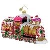 A glittering gold train is accented with peppermint swirl candy wheels and candy cane trim.