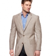 Modern comfort and classic charm go hand in hand with this expertly tailored blazer from Michael Kors.