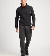 Edgy and modern in luxe lambswool, an essential mockneck sweater gets a sporty update with an asymmetrical half-zip placket and an angled taffeta pocket at the chest.Mockneck collarRibbed collar, cuffs and hemLambswoolDry cleanImported