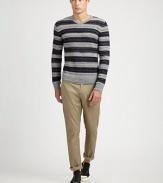 A modernized version of the favorite striped sweater, crafted with a fine-gauge softness by the label defining contemporary knitwear. V-neck84% merino wool/8% baby camel/8% nylonDry cleanImported
