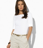 A chic boat neckline lends the ultra-soft cotton shirt, finished with elbow-length sleeves and rolled cuffs, modern, casual appeal.