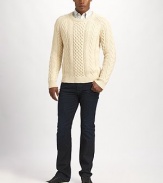 A versatile addition to any man's wardrobe, crafted with easy cotton softness in a chunky cable-knit design. CrewneckRibbed neckline, cuffs and hem78% cotton/19% acrylic/3% polyamideMachine washImported