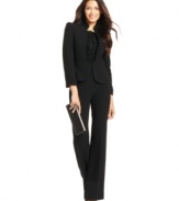 Ruffles add a whimsical touch to the streamlined silhouette of Tahari by ASL's pantsuit.