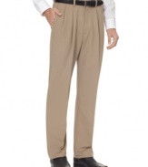 Lightweight and ready for the road, these wrinkle-free Haggar dress pants make a great choice for a guy on the go.